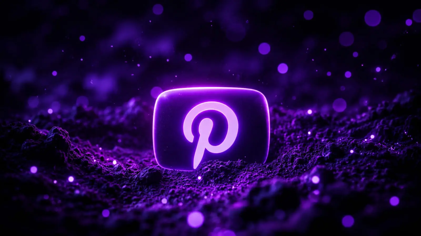 Pinterest logo glowing in dark environment representing untapped traffic source for creators
